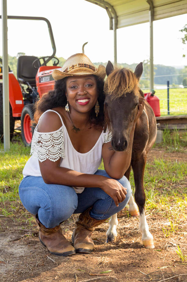 Author Abriana Johnson and her Mini Horse Encore