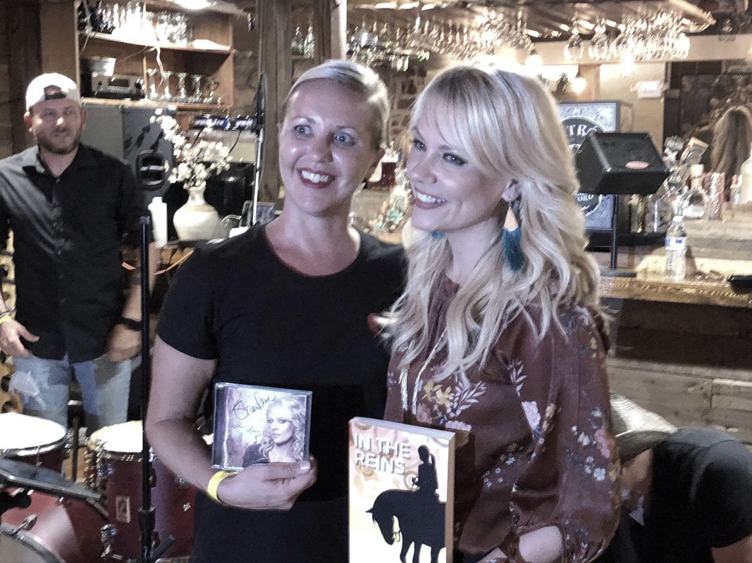Author Carly Kade and Country Artist Shari Rowe at the Horse & Agriculture Anniversary Party in Prescott, Arizona